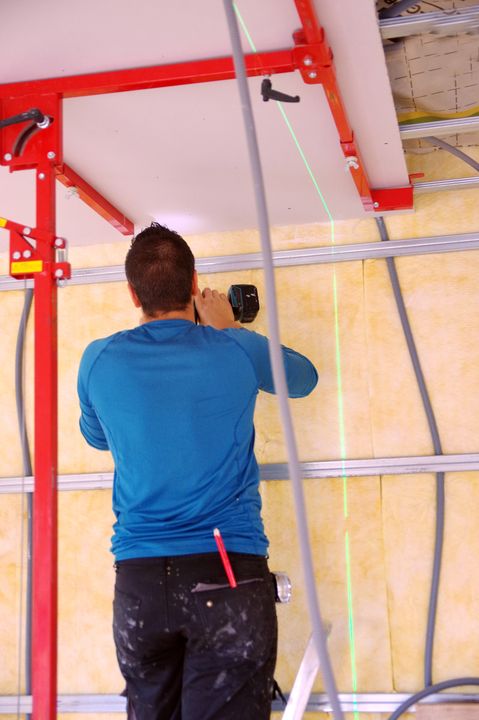 Pose de plaque de plâtre avec laser à Audenge